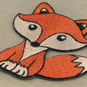 a close up of a patch of a fox